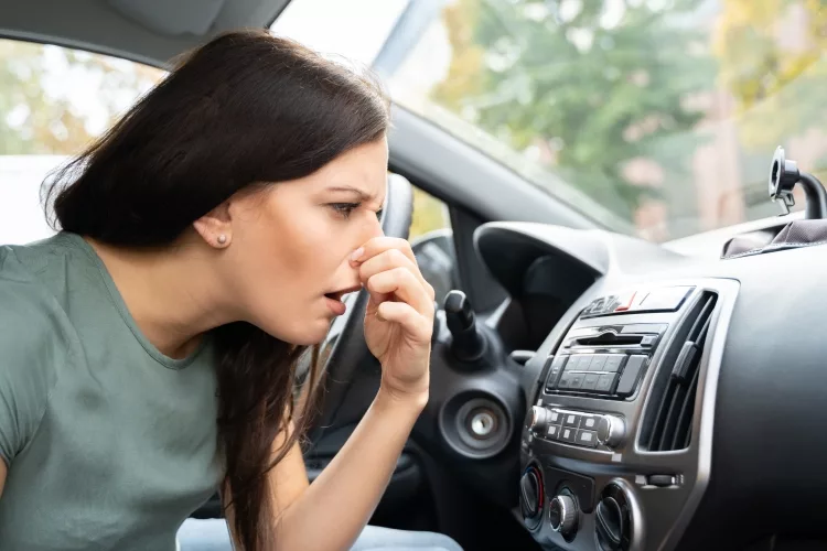 How to get gas smell out of car